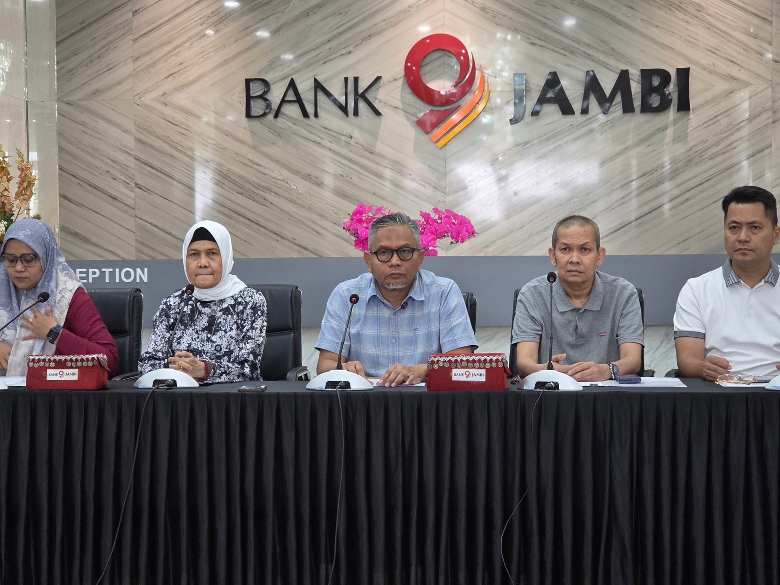 siaran pers resmi Bank Jambi gangguan sistem 22 Februari 2026.