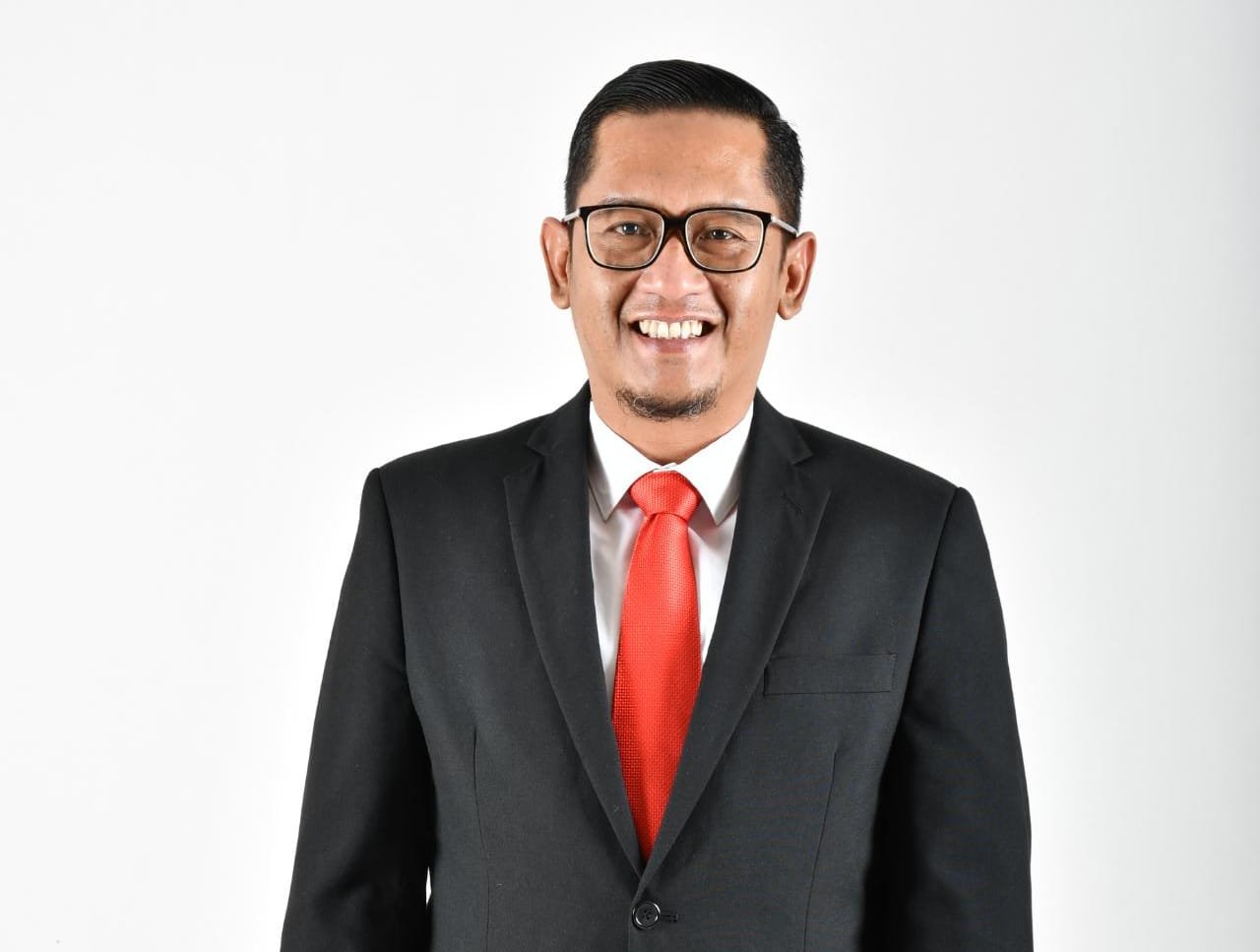 alt="Kepala Kanwil II KPPU Wahyu Bekti Anggoro menyampaikan materi regulasi Pasal 22 UU Nomor 5 Tahun 1999 secara daring"